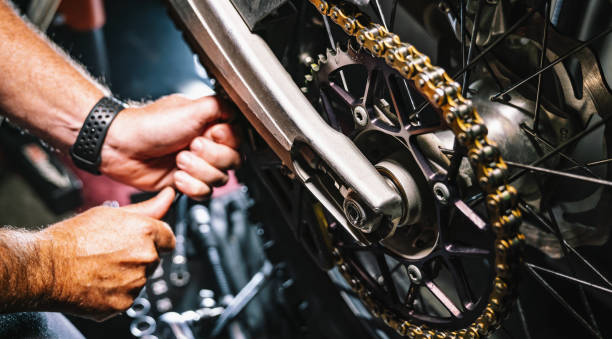 istock Mechanic working in garage. Repair service. 1400267342
