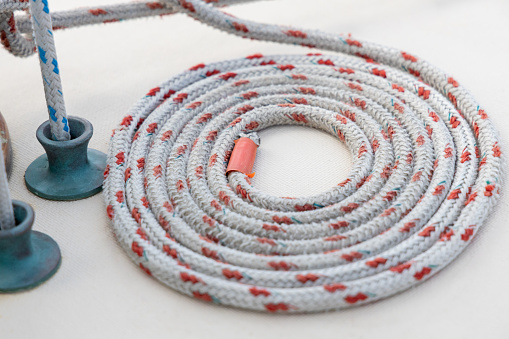 Orange and Grey Rope Cheesed Down on a Yacht