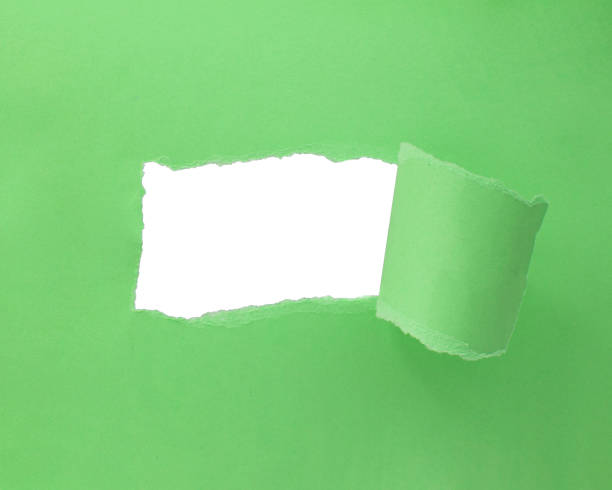 istock Paper green color background with hole copyspace 1400268881