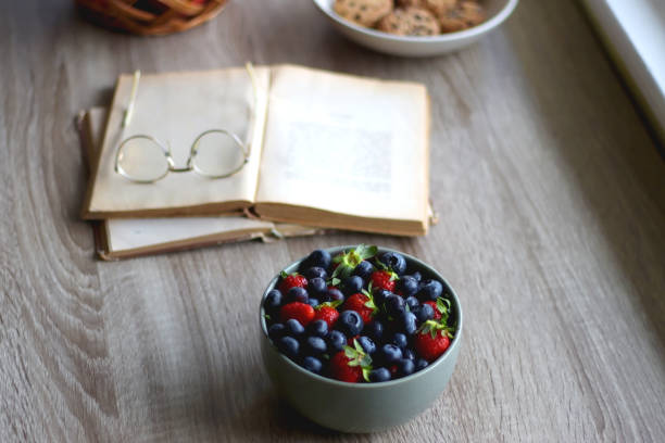 istock Fruit, Cookies, Books and Glasses 1400270016