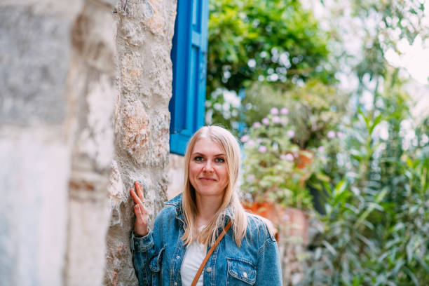 istock Blond Woman on Traditional Mediterranean Streets 1400270429