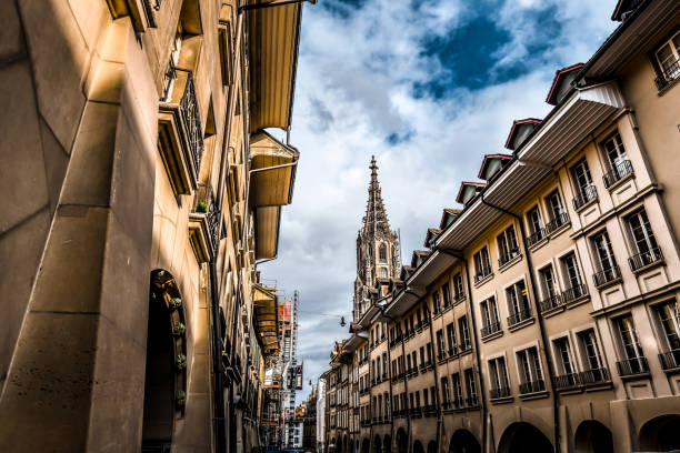 istock Sunset Above Bern Munster Cathedral While It's Seen Behind Apartment Buildings In Bern, Switzerland 1400271420