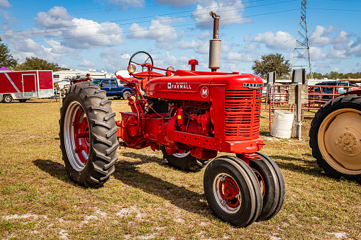Fort Meade, FL - February 23, 2022: 1950 International Harvester McCormick Farmall Model M at local tractor show
