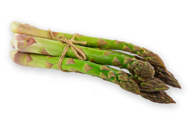 istock Vegetarian fresh green asparagus. vegetable isolated on white background 1400281340
