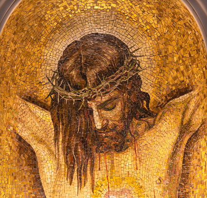 Rome - The mosaic of Jesus on the cross after Velasqez in the church Chiesa di Santa Maria Addolorata designed by from Mosaic school of Montepulciano.
