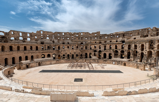 Amphitheatre of El Jem in Tunisia. Amphitheatre is in the modern-day city of El Djem, Tunisia, formerly Thysdrus in the Roman province of Africa. It is listed by UNESCO since 1979 as a World Heritage Site