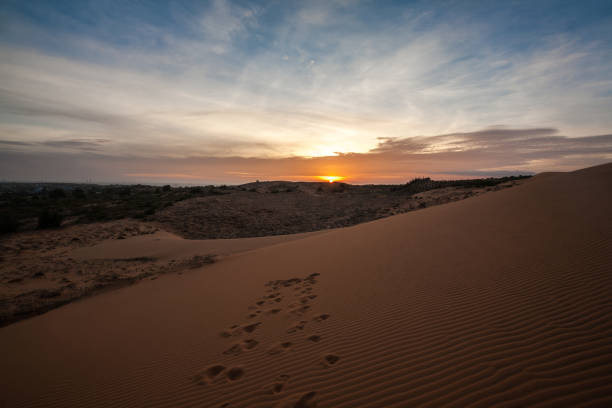 istock Sunset at Red Sand Dune, Desert in Mui Ne, Vietnam 1400284365