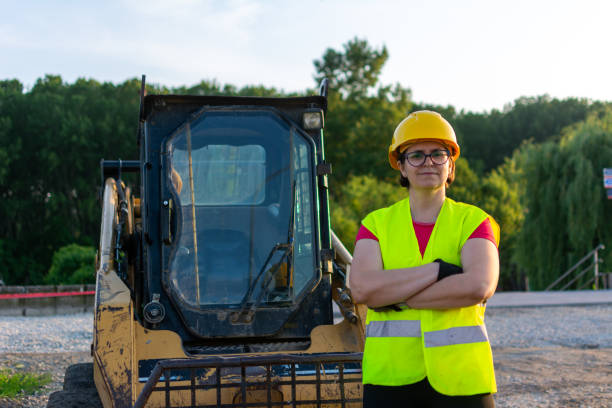 istock Confident female architect standing at quarry 1400285190