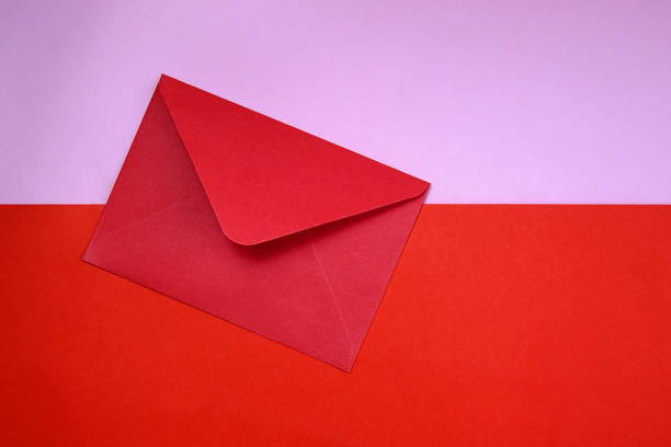 istock The burgundy envelope lies on red and lilac backgrounds at the same time. 1400285199