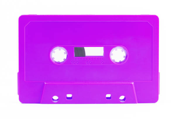 istock One single simple funky light neon purple analog audio cassette tape object isolated on white, cut out, nobody. Retrowave, synthwave retro vintage 80s 90s aesthetic style symbol, gadget, no people 1400287720