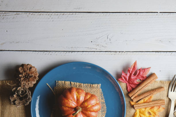 istock thanksgiving day. autumn background with pumpkin 1400287925