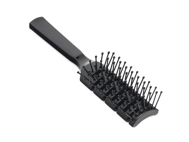 istock Black hair brush isolated on white 1400289356