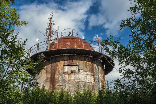 Abandoned military tower with antennas