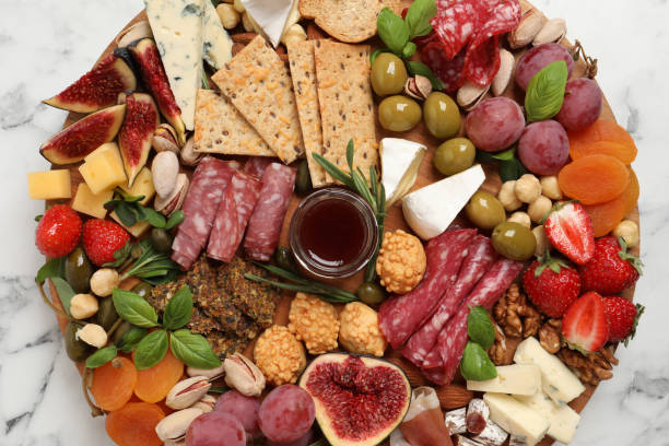istock Different tasty appetizers on white marble table, top view 1400290711