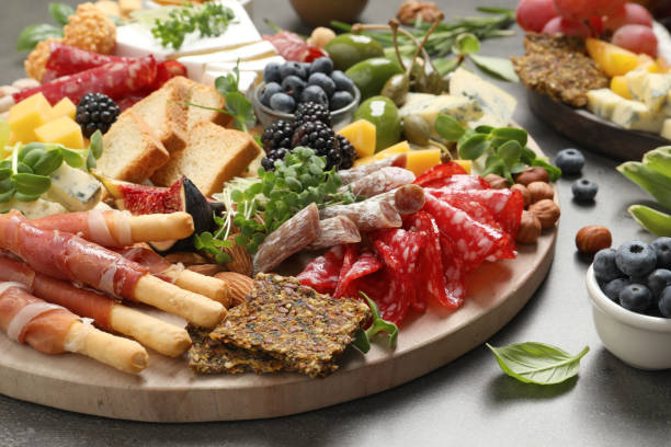 istock Many different tasty appetizers on table, closeup 1400290765