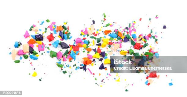 Colorful Graphite Crumbs On White Background Pencil Sharpening Stock Photo - Download Image Now