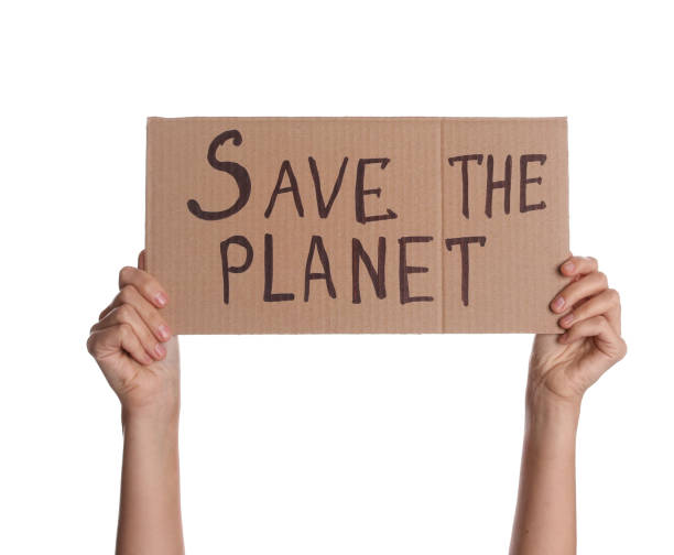 istock Protestor holding placard with text Save The Planet on white background, closeup. Climate strike 1400291726