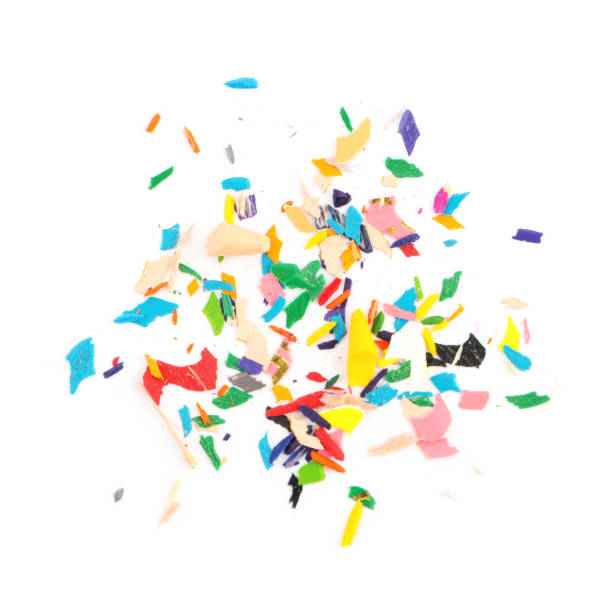 istock Colorful graphite crumbs on white background, top view. Pencil sharpening 1400292373
