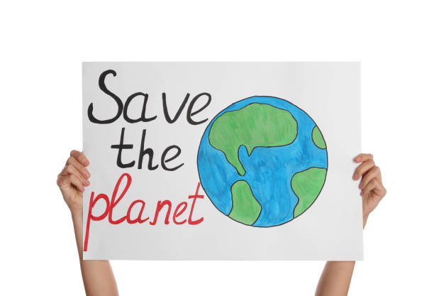 istock Protestor holding placard with text Save The Planet on white background, closeup. Climate strike 1400292459