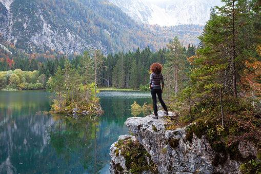 Mid Adult Woman Enjoying Nature tranquility in European Alps