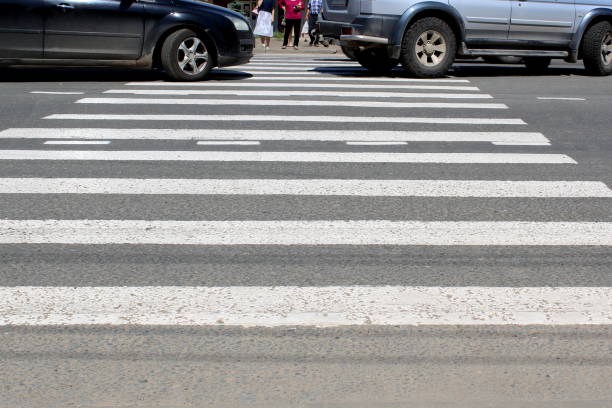 Pedestrian crossing through the roadway.