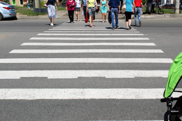 Pedestrian crossing through the roadway.