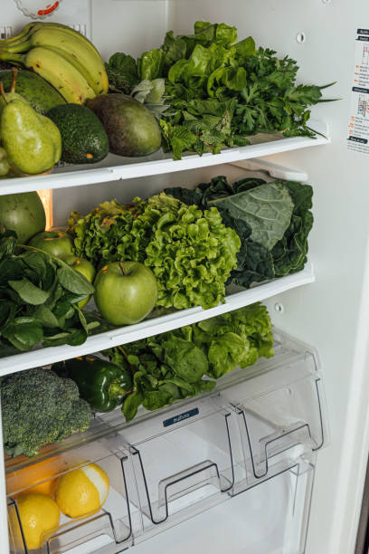 istock Fresh vegetables and fruits in the fridge 1400297721