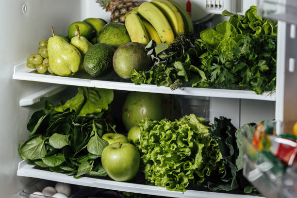 istock Fresh vegetables and fruits in the fridge 1400297751