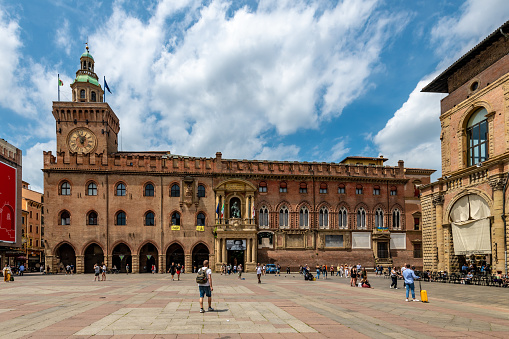 Bologna, Italy. Tuesday 24 May 2022. People in front of Palazzo d'Accursio in bologna, Italy