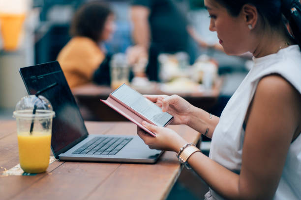 istock Asian Woman Working On Her Laptop 1400301570