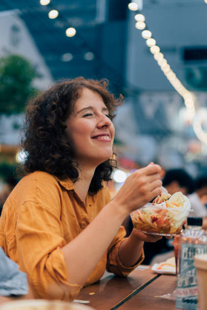 istock Woman Enjoying Her Food 1400301604