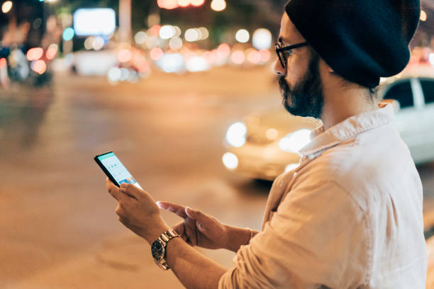istock Indian Man Looking At The Map On His Smartphone 1400301612