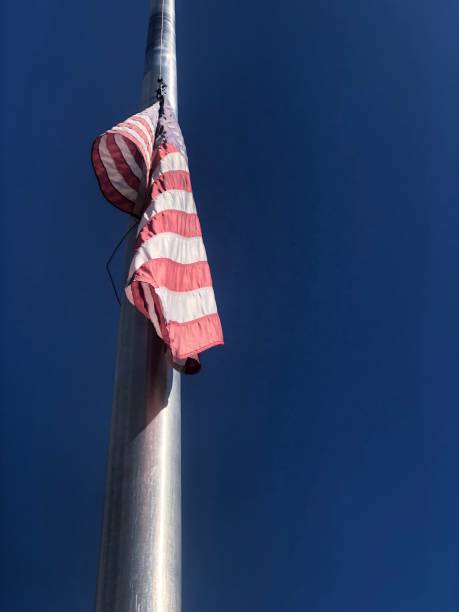 istock U.S.A. flag at half mast 1400302984