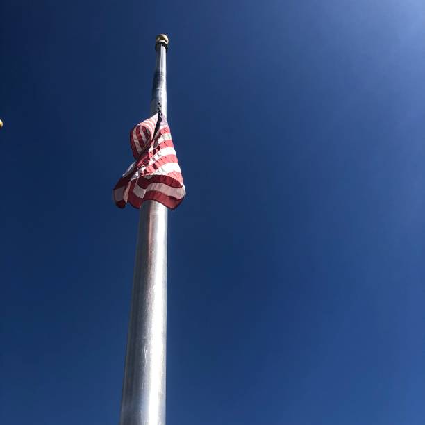 istock U.S.A. flag at half mast 1400302990