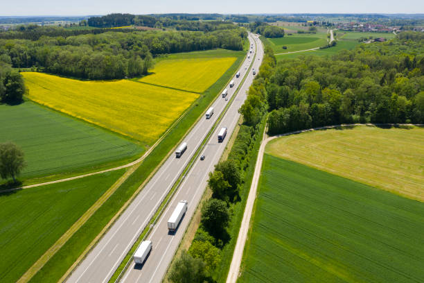 Highway with Trucks in Rural Area, Aerial View