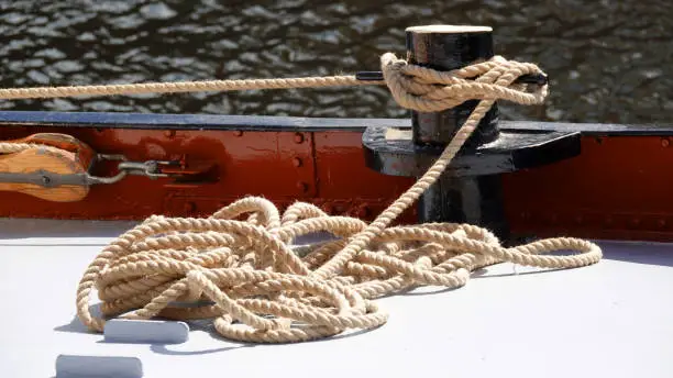 Photo of Rope on the deck of an old fisherboat.