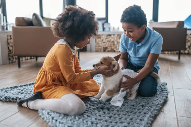 istock Children enjoying time with their puppy 1400305333