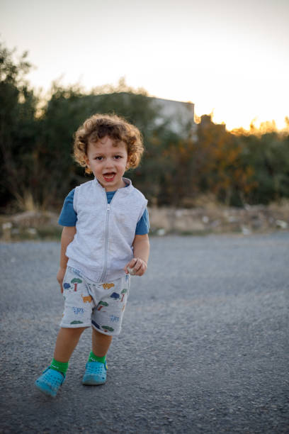 istock Cute boy having fun outdoors 1400306248