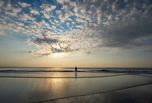 istock Man relaxing on summer vacation on the beach. 1400306518
