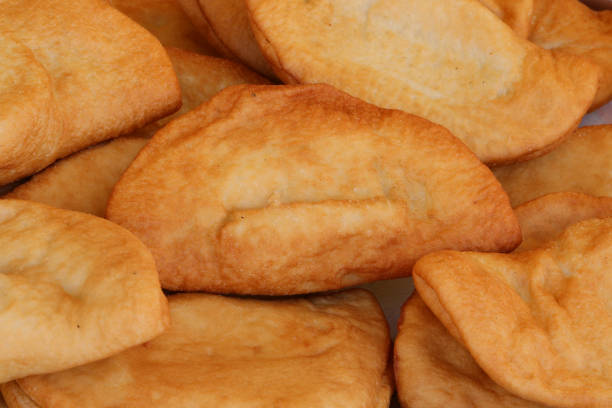 Italian food called PANZEROTTO also known as panzarotto a turnover like  a small calzone both in shape and dough used for its preparation