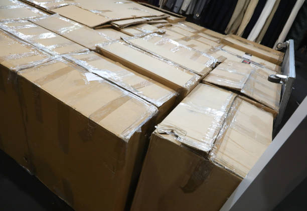 istock warehouse with corrugated cardboard boxes closed with tape during the evacuation 1400307976