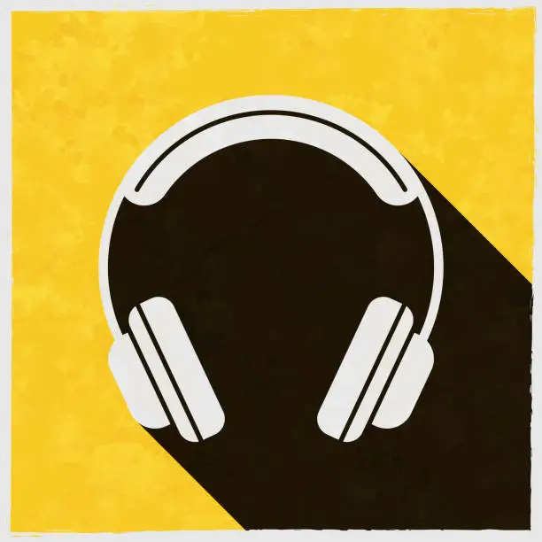 Vector illustration of Headphones. Icon with long shadow on textured yellow background