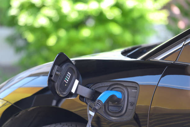 istock Electric car at the charging port 1400315837