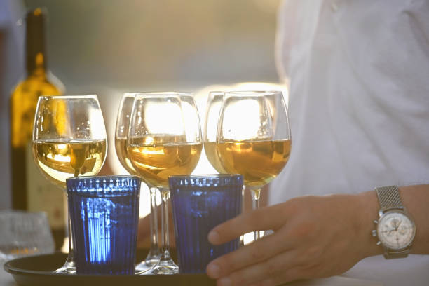 istock Glasses with wine and water on the bar counter 1400315856
