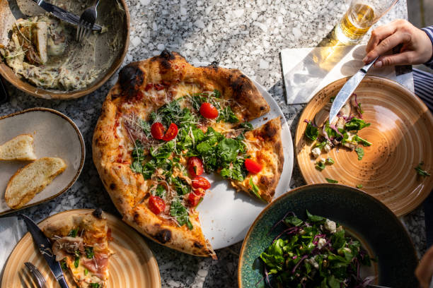 istock Delicious plates with beautifully served food on a restaurant table 1400316742