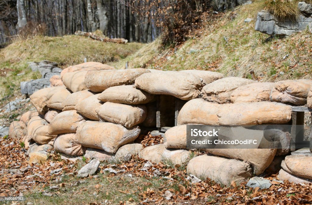 Sandbags for the protection of the war trenches dug into the mountain by the army Sandbags for the protection of the war trenches dug into the mountain by the soldiers army World War I Stock Photo