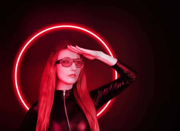 istock Futuristic woman with neon light glasses. 1400318509