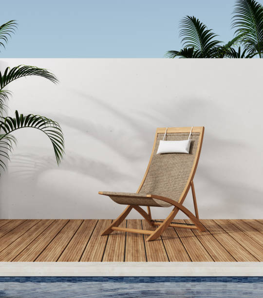 istock Lawn chairs and swimming pool in modern backyard with palm, 3d rendering 1400328733