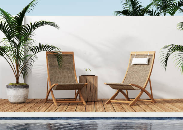 istock Modern garden with lawn chairs, swimming pool and wooden deck, 3d rendering 1400328735