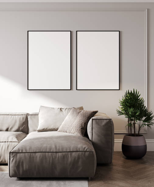 istock blank two frames mock up in modern living room interior with gray sofa, and palm tropical leaves, 3d rendering 1400329219